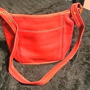 Coach shoulder bag. Color: red